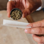 A guy using wood rolling paper pulp