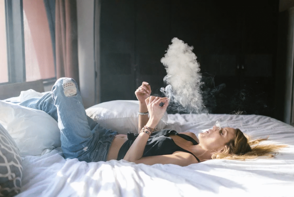 woman smoking a pre-roll