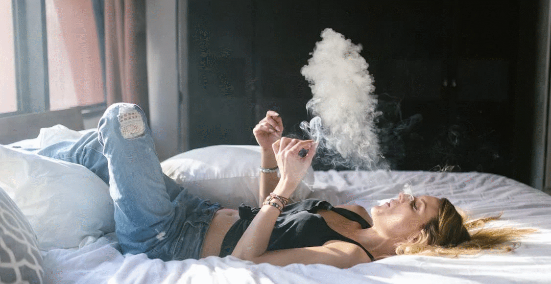 woman smoking a pre-roll